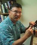 Author Joe Perrone Jr. at his fly tying vise