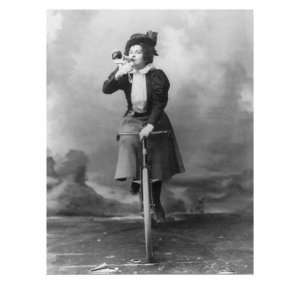 Madge Lessing, English Actress and Singer, Riding Bicycle, and Holding 