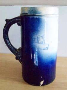 Antique Cobalt Blue Beer Stein with Monk displayed on side, produced 