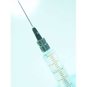 Unsanitary Hypodermic Needle Containing Clear Liquid Photographic 