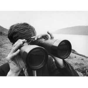 Watching for the Loch Ness Monster Through a Pair of Binoculars 