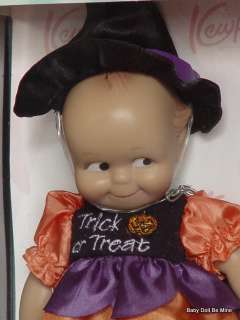   look too scary no matter how hard she tries kewpie is 8 inches and all