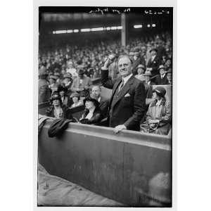   Mayor James J. Hylan throwing first ball (baseball)