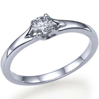 The Waves ring set with a 0.20ct G H SI1 center Natural diamond.