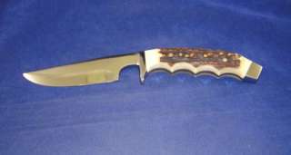 This is a very nice J.A. Hinckels drop point sheath knife. The knife 