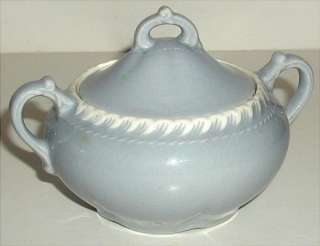   sugar bowl, approximately 4 tall with lid, 6 from handle to handle