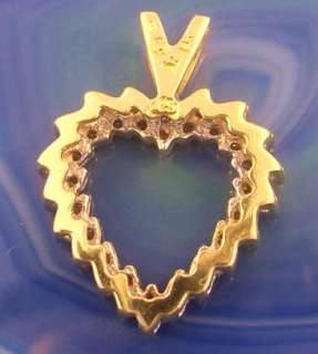 This is a wonderful 14kt YELLOW GOLD, (stamped), DIAMOND HEART PENDANT 