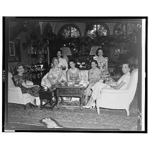  Barbara Hutton, seated (left), with group of women,1954 