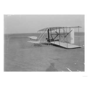 Wilbur Wright in damaged plane after unsuccesful flight Photograph 