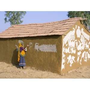 Woman Painting Walls of a House in a Village Near Jodhpur, Rajasthan 